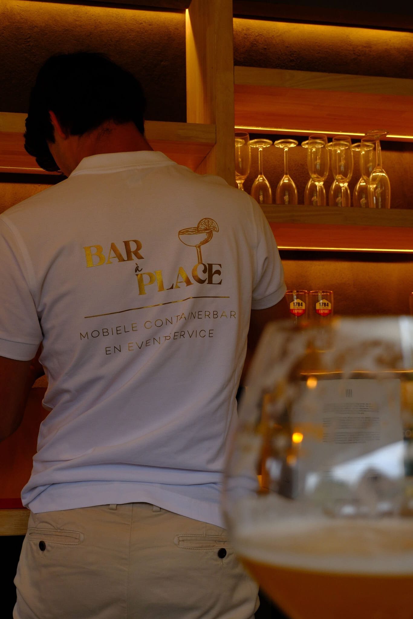Bar à Place polo met het gouden logo